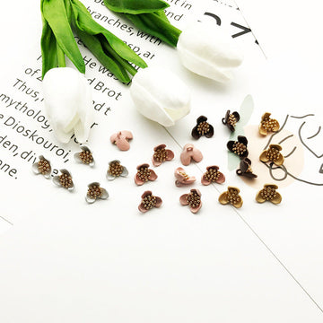 Blumenknöpfe mit Metallschaft, goldfarbenem Staubgefäß; mehrere Farben im Pack