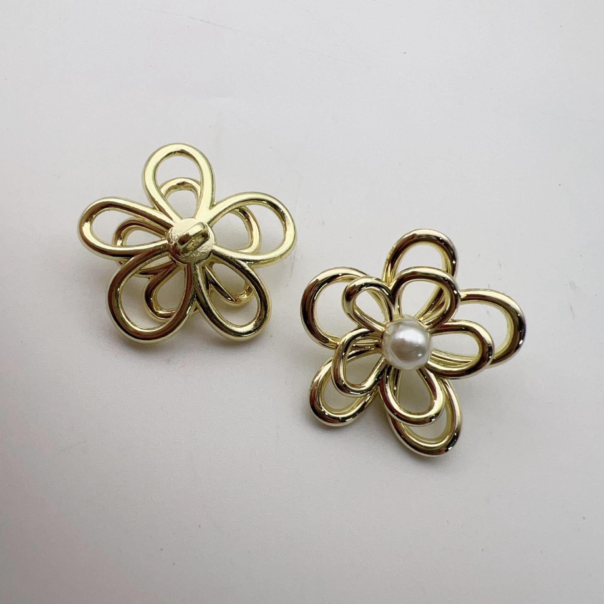 Vintage gold flower buttons with white pearl centers, shown as two styles