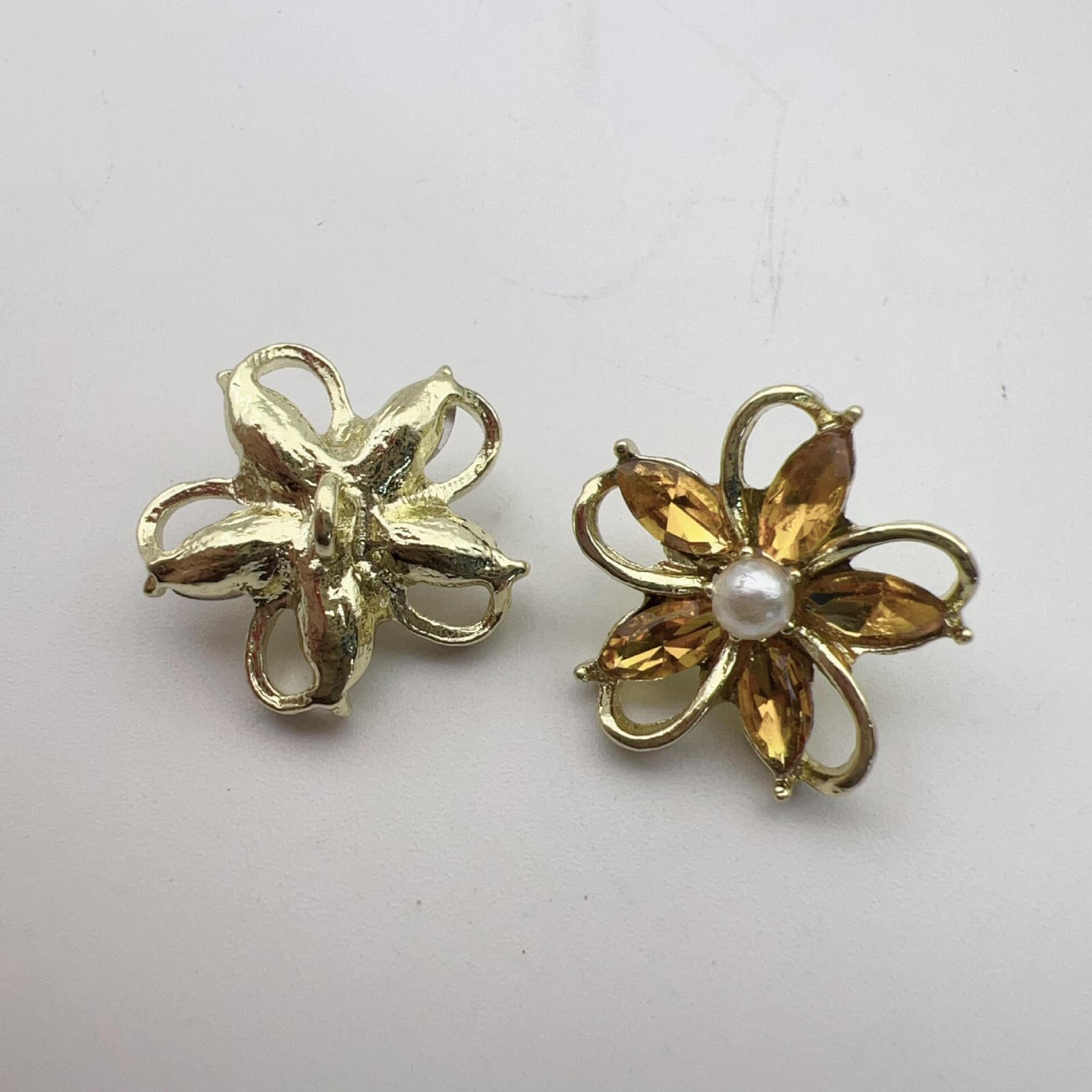 Vintage gold flower buttons: left plain; right amber crystal petals with white pearl center