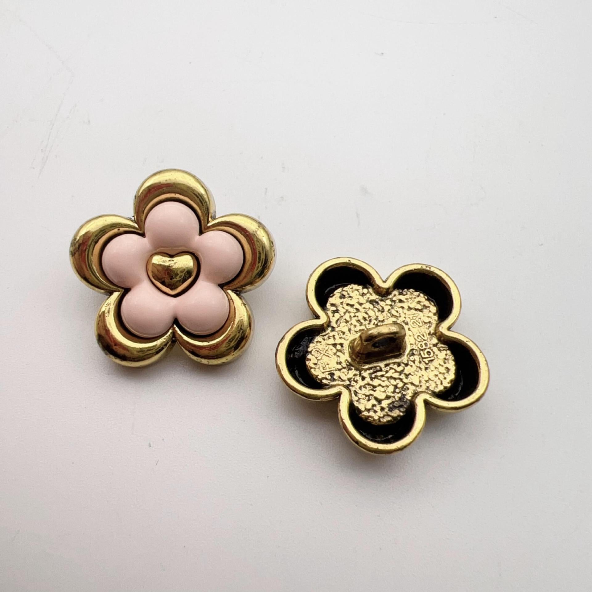 Vintage five-petal flower metal dot shank buttons, light pink front, gold-and-black back