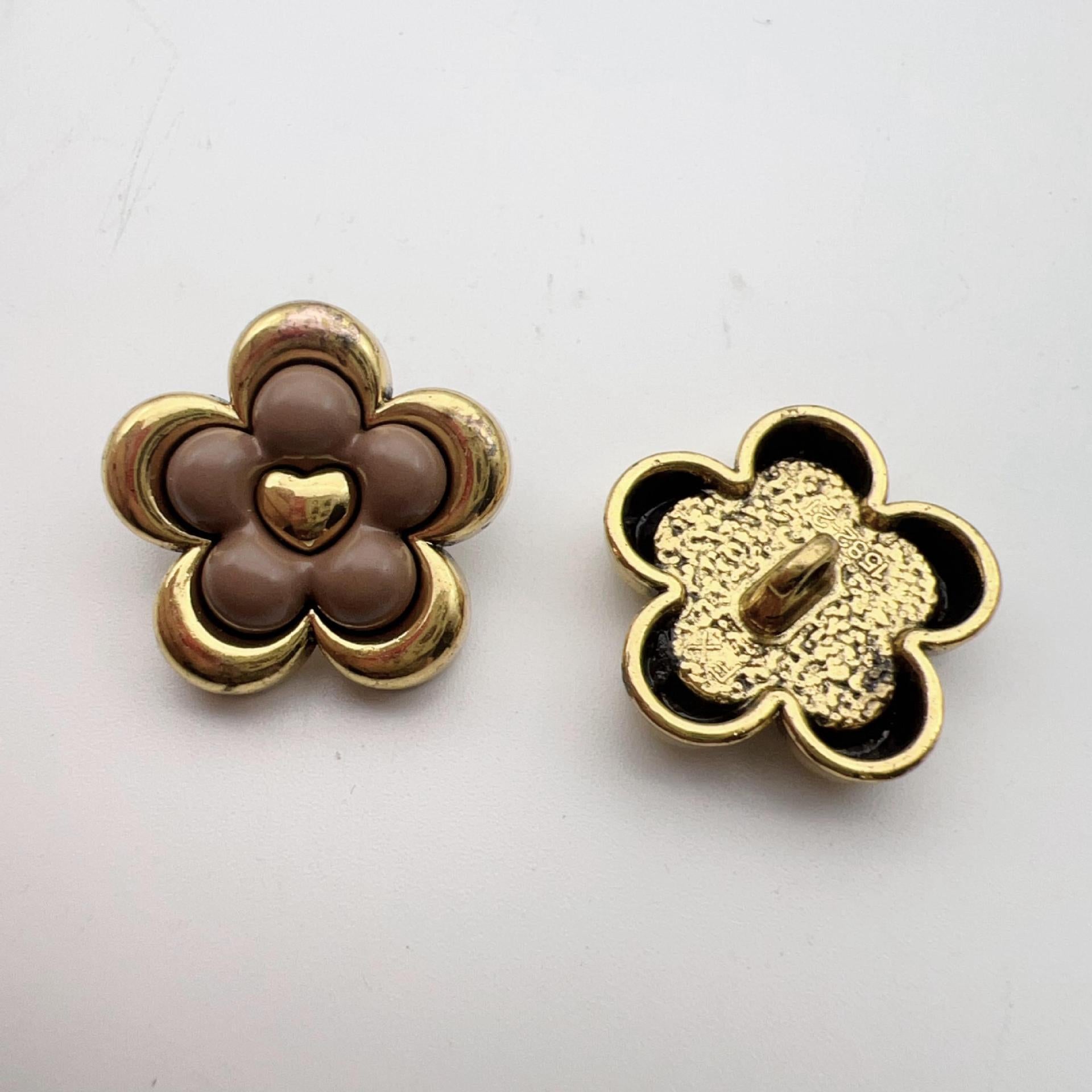 Vintage five-petal flower metal dot shank buttons, brown front, gold-and-black back