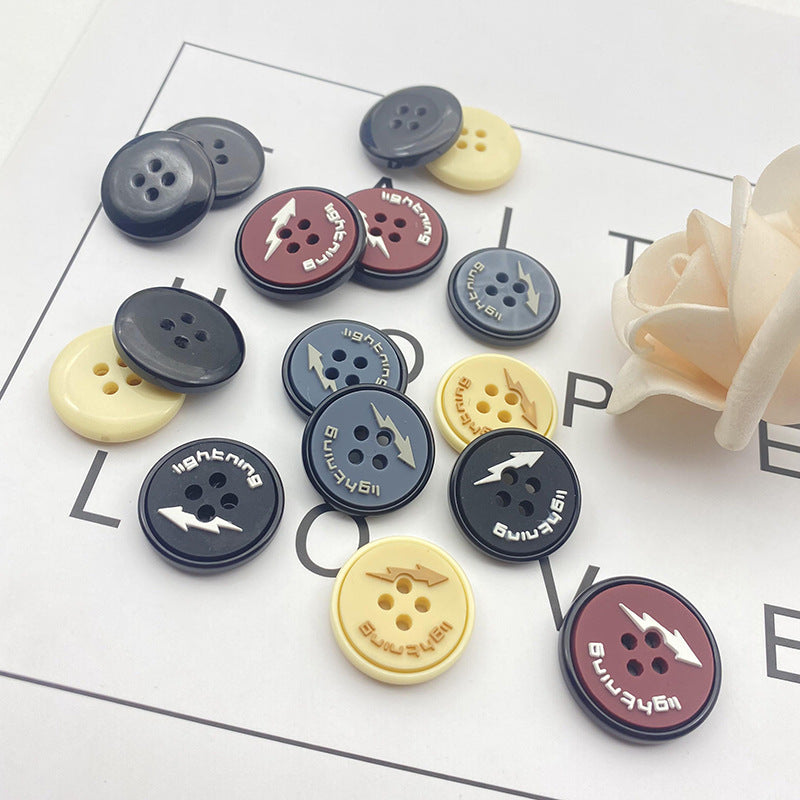 Round 4-hole resin buttons with navy lightning graphic, pack of 48