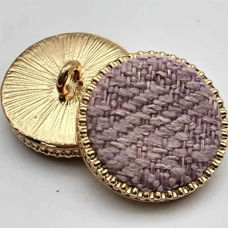 Round fabric shank buttons with gold rim: mauve-lavender front, gold back plate