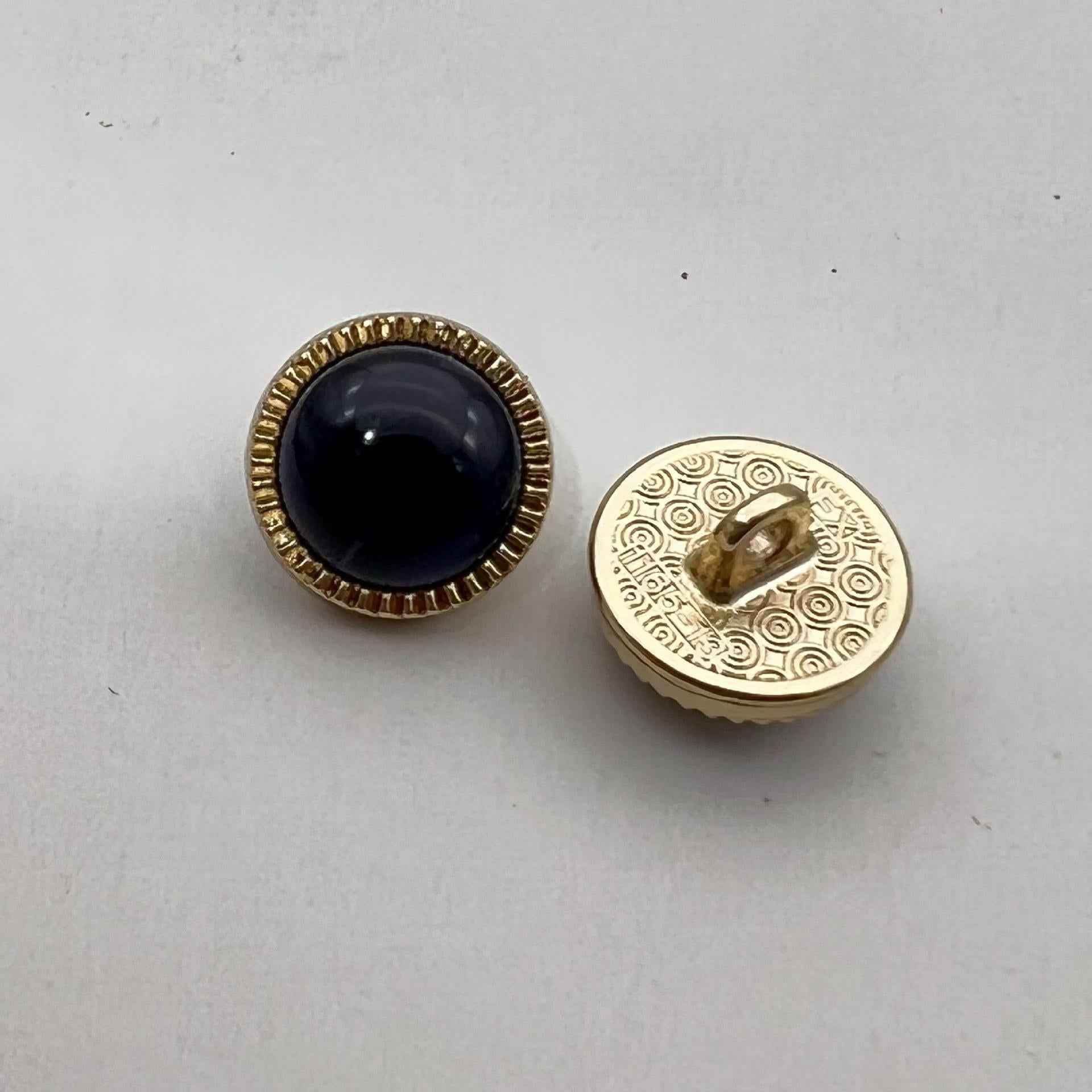 12.5mm pearlized cat’s eye metal shirt button pair, black stone, gold-tone shank