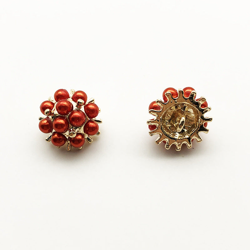 Red beaded sunflower shank button with gold-tone scalloped metal back.