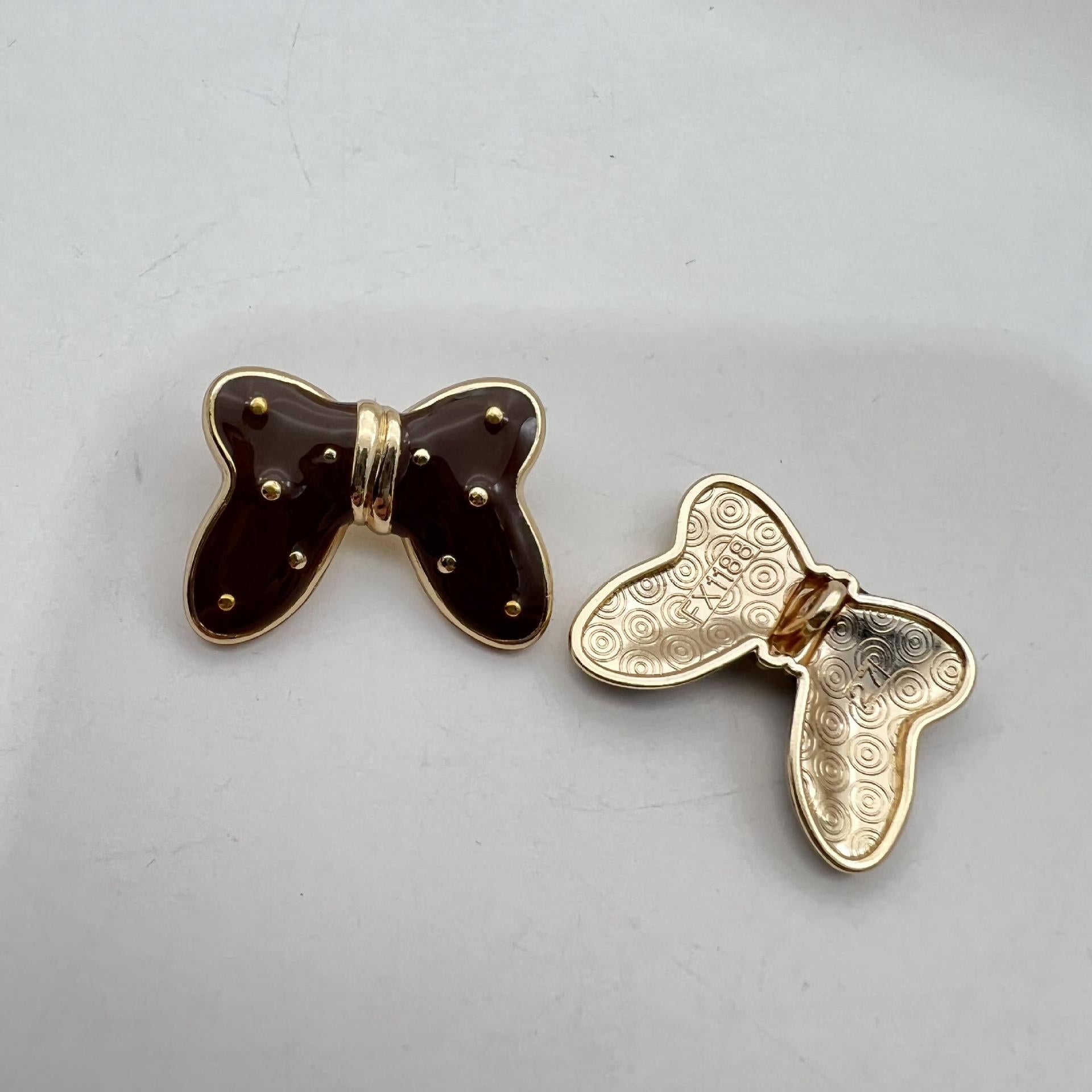 Dark brown butterfly starry metal large shank button with gold-tone edging
