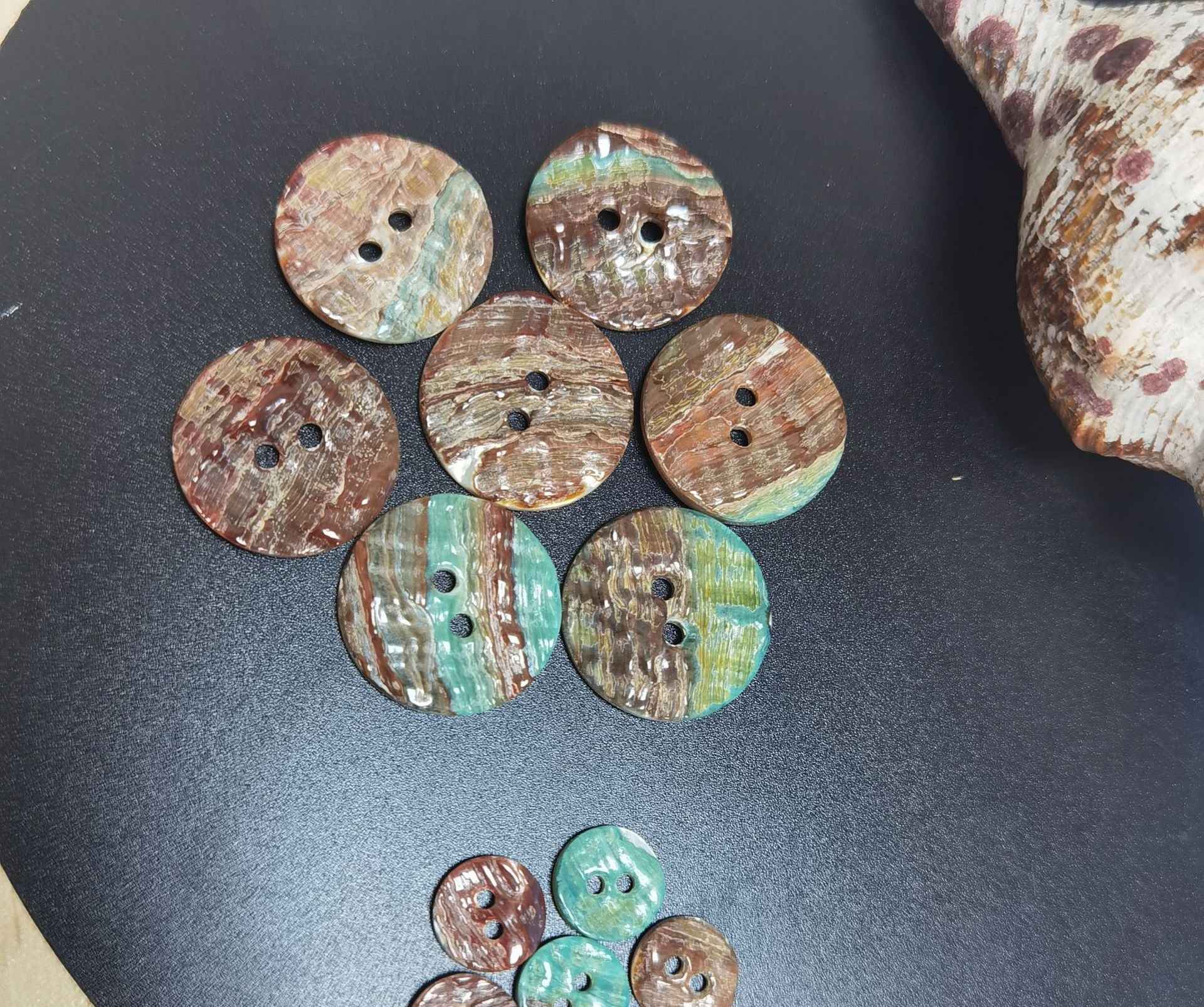 Abalone shell knitting buttons, 2-hole design, mixed tones of brown, green, and blue iridescence