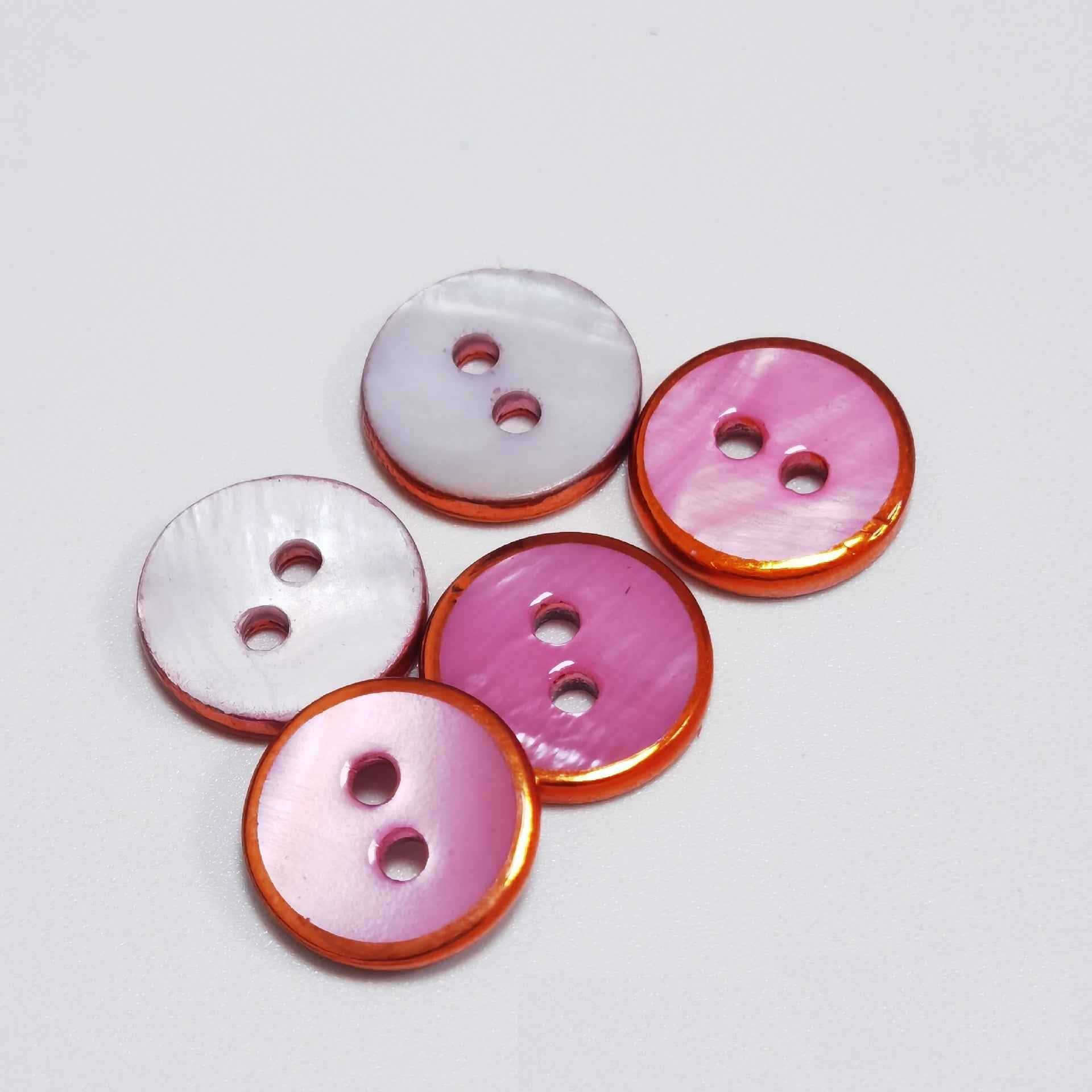 Round 2-hole freshwater shell buttons, white and pink with orange-gold edge (pack)