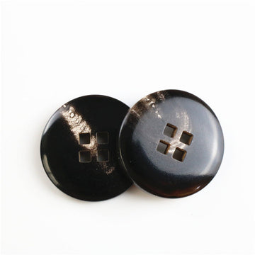 Round black buffalo horn buttons, four square holes, 2 shown from front