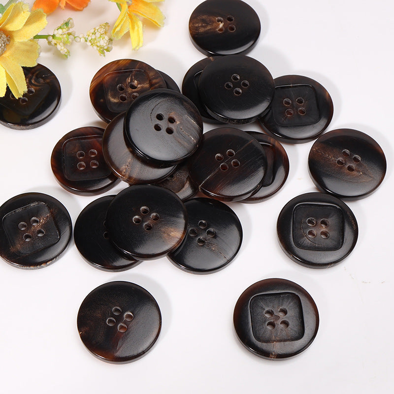 Horn buttons assortment, round face with four-hole pattern, mixed dark and coffee tones