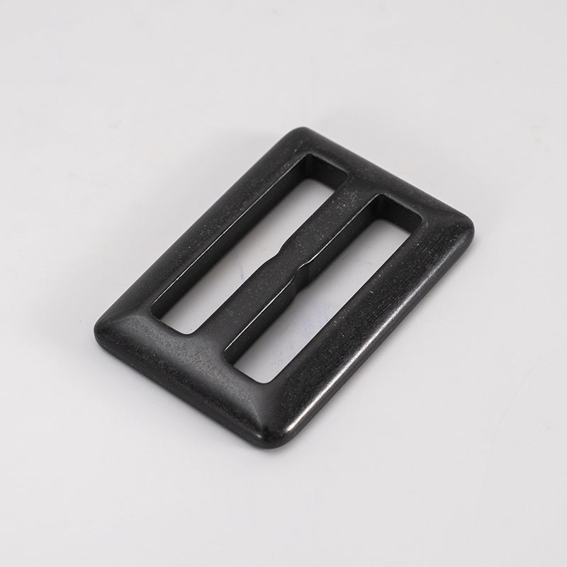 Black horn belt adjuster buckle, rectangular with two parallel openings