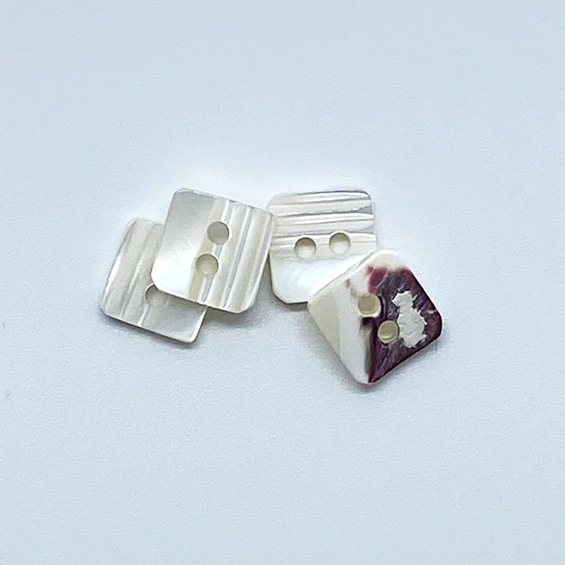 Square conch shell buttons with two holes: white with stripes and purple marbled piece (3 shown)
