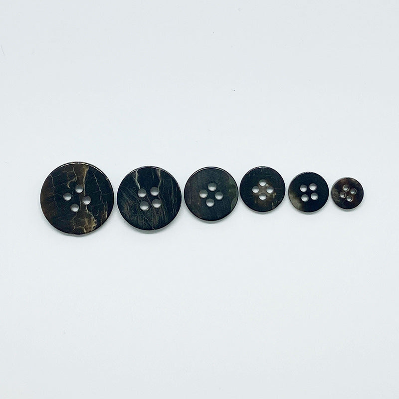 Assorted black round 4-hole shell buttons in multiple sizes, 10 pcs