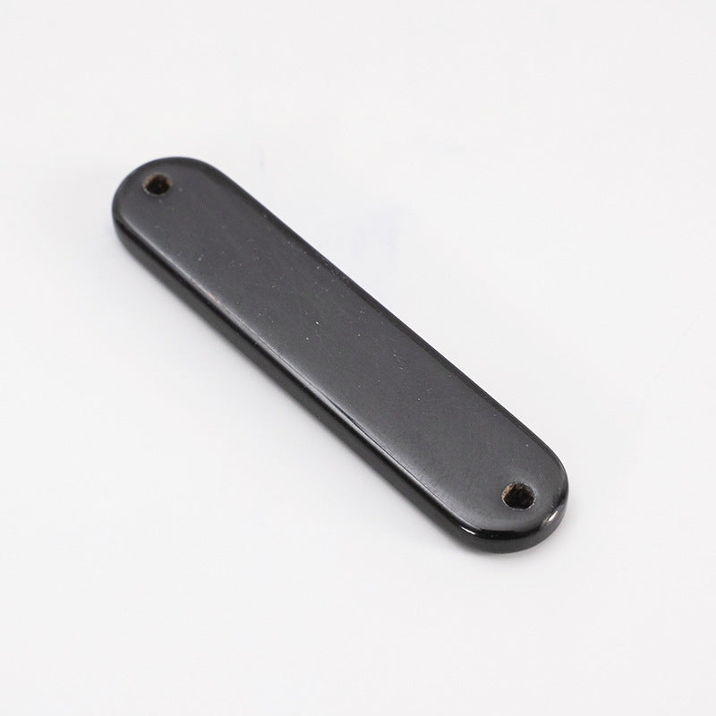 Black oval 2-hole horn button, 45mm—single button view