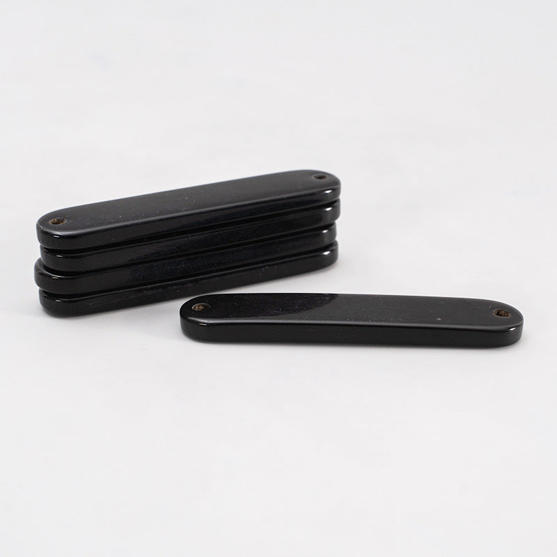 Black oval 2-hole horn buttons, 45mm, two stacked pieces