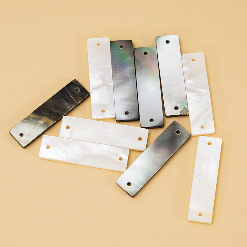 Rectangular shell shirt buttons with wide edge, mix of white and iridescent dark tones