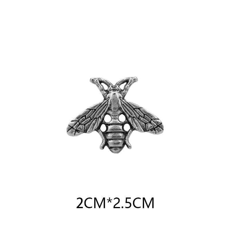 Silver-tone bee brooch pin, 2cm x 2.5cm, textured wings and striped body