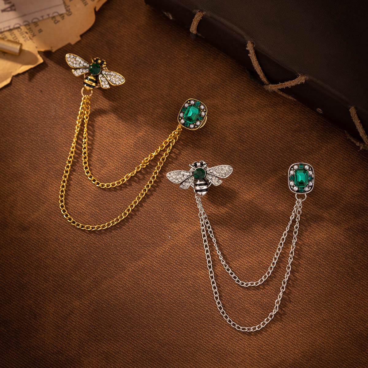 Bee tassel brooch set with green crystal centers, gold-tone chains, 2 pieces