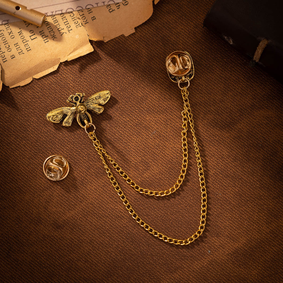 Gold bee tassel brooch with chain and round pin backs