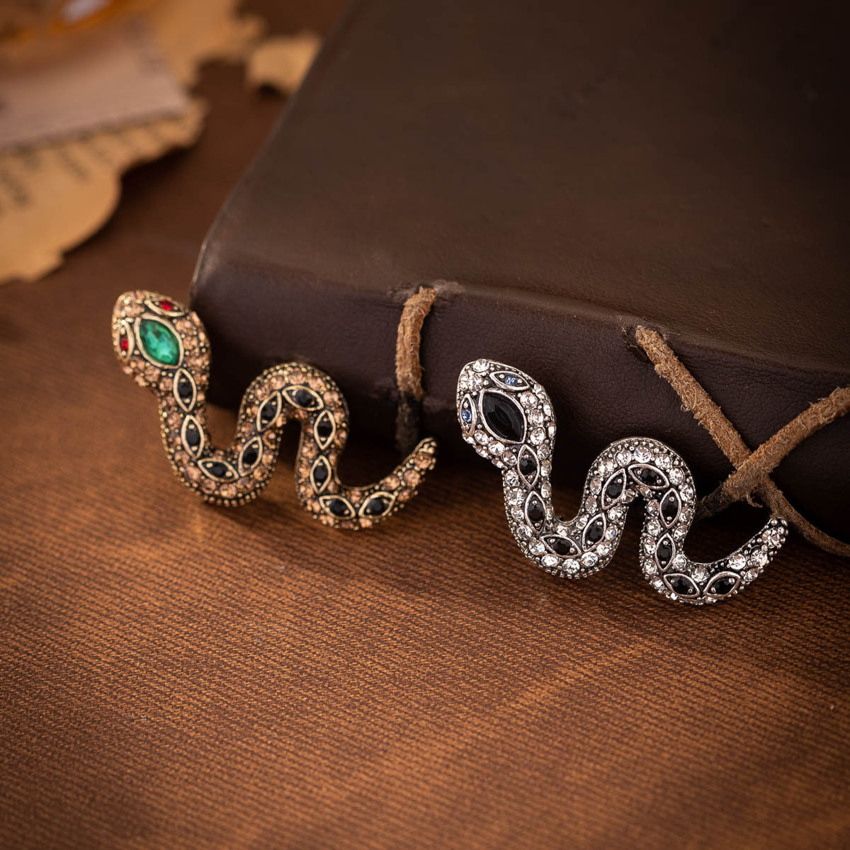 Retro rhinestone little snake brooch, gold-tone with green center and dark stones
