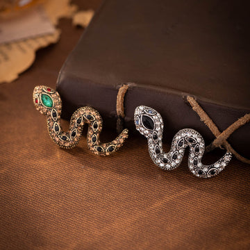 Retro rhinestone little snake brooch, gold-tone with green center and dark stones