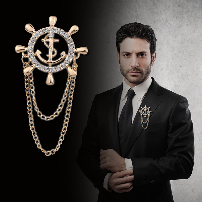 Gold anchor and rudder wheel chain brooch with rhinestones and dangling links