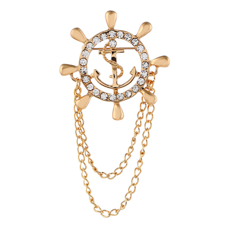 Gold anchor and rudder wheel chain brooch with rhinestones and hanging chain drops