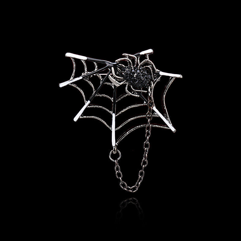 Spider-web brooch with black rhinestone spider and hanging chain