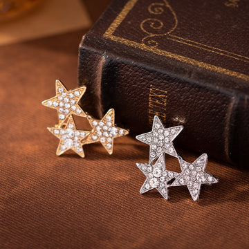 Gold three star diamond lapel pin set, five-point stars with clear stones