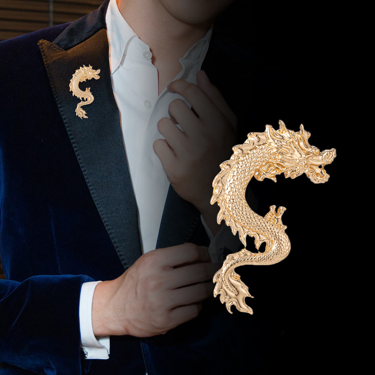 Goldfarbene Drachen-Anstecknadel am Revers, Flügel-Detail am Blazer