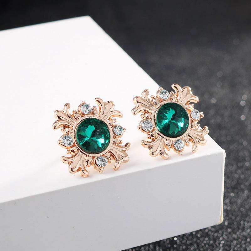 Green crystal cross lapel pin pair, rose-gold tone, clear stone accents