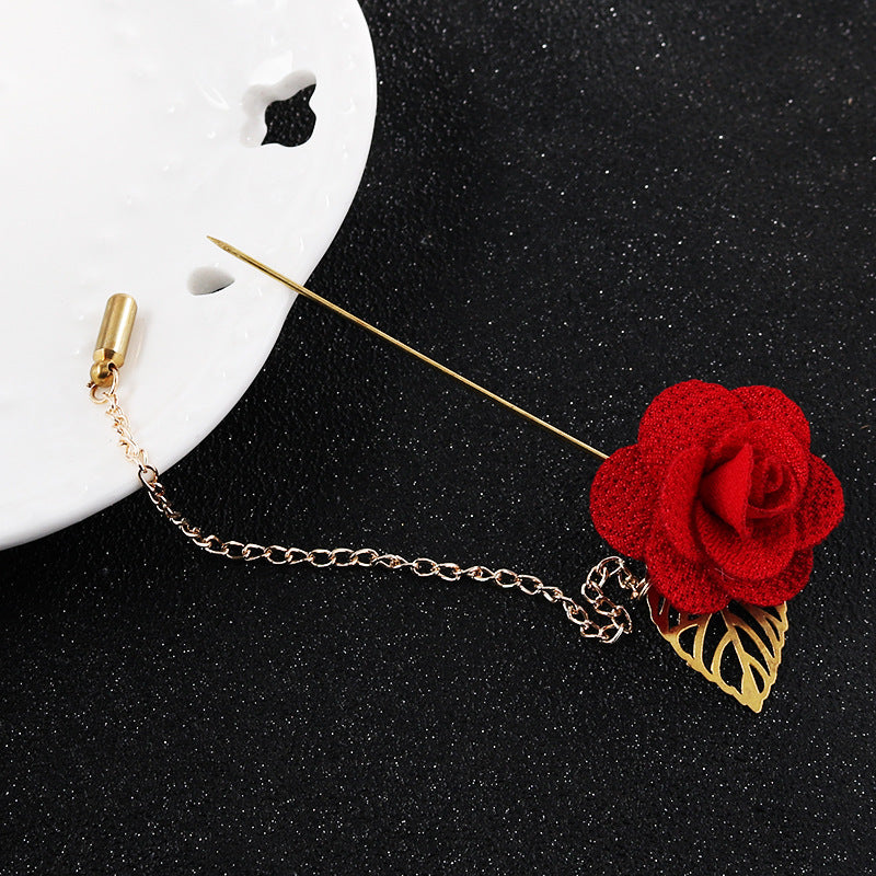 Red flower leaf brooch with gold chain and leaf charm, bar pin end