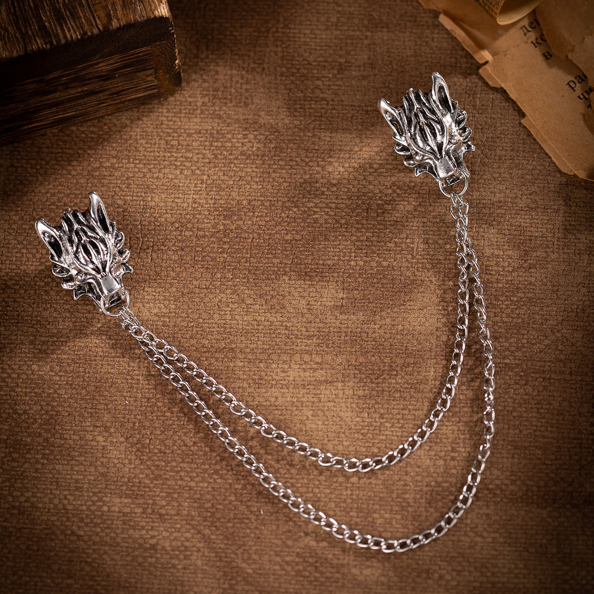 Silver wolf head chain lapel brooch with twin linked chains
