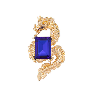 Gold-toned Chinese dragon brooch with rectangular blue crystal inlaid center
