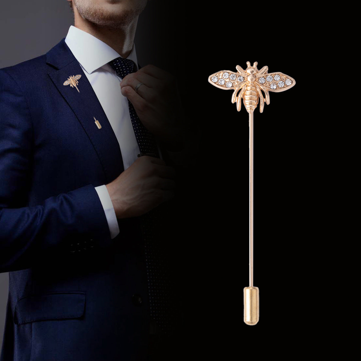 Gold-tone bee brooch pin with clear rhinestone wings on a jacket lapel