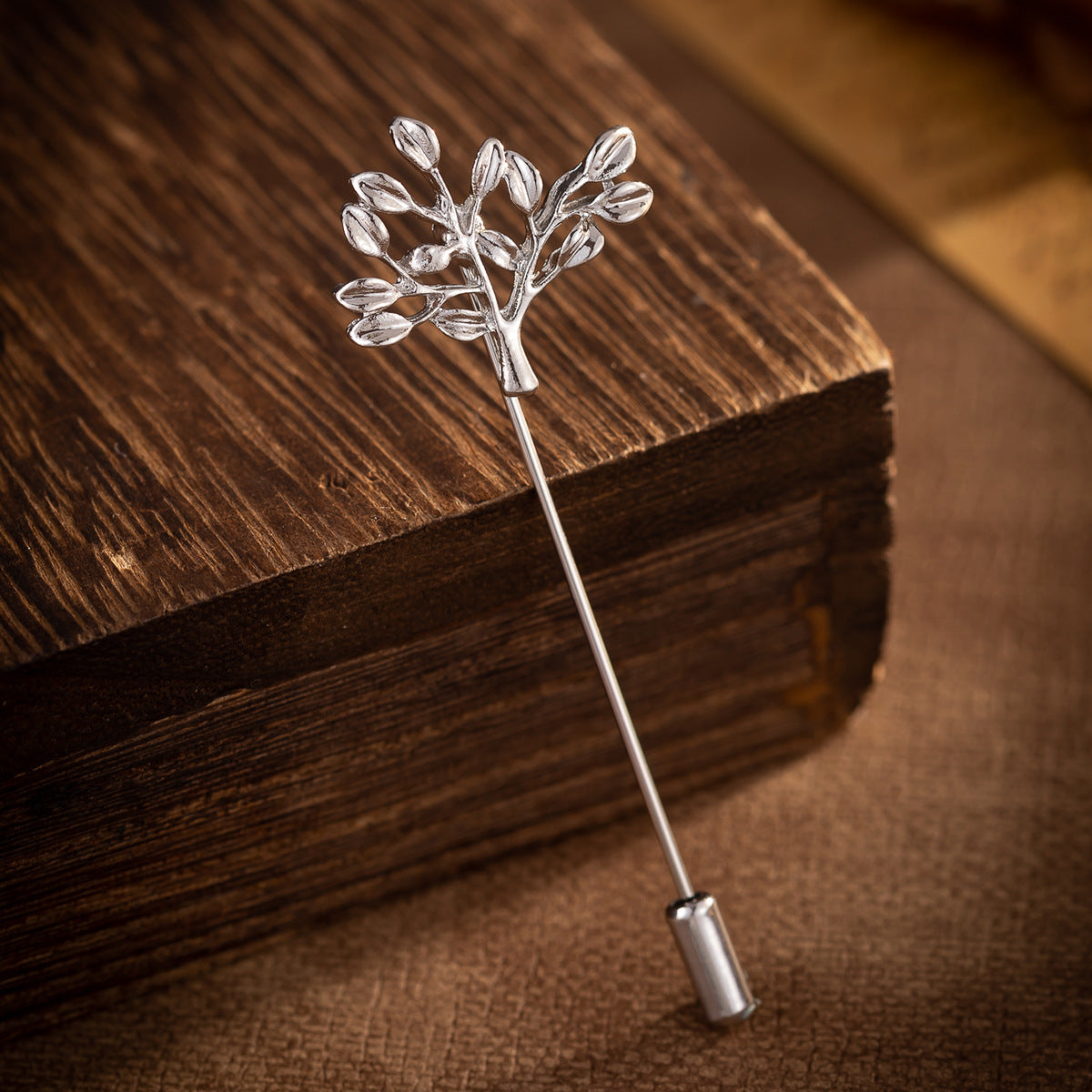 Silver-tone tree or branch brooch pin with leaf cluster and straight post