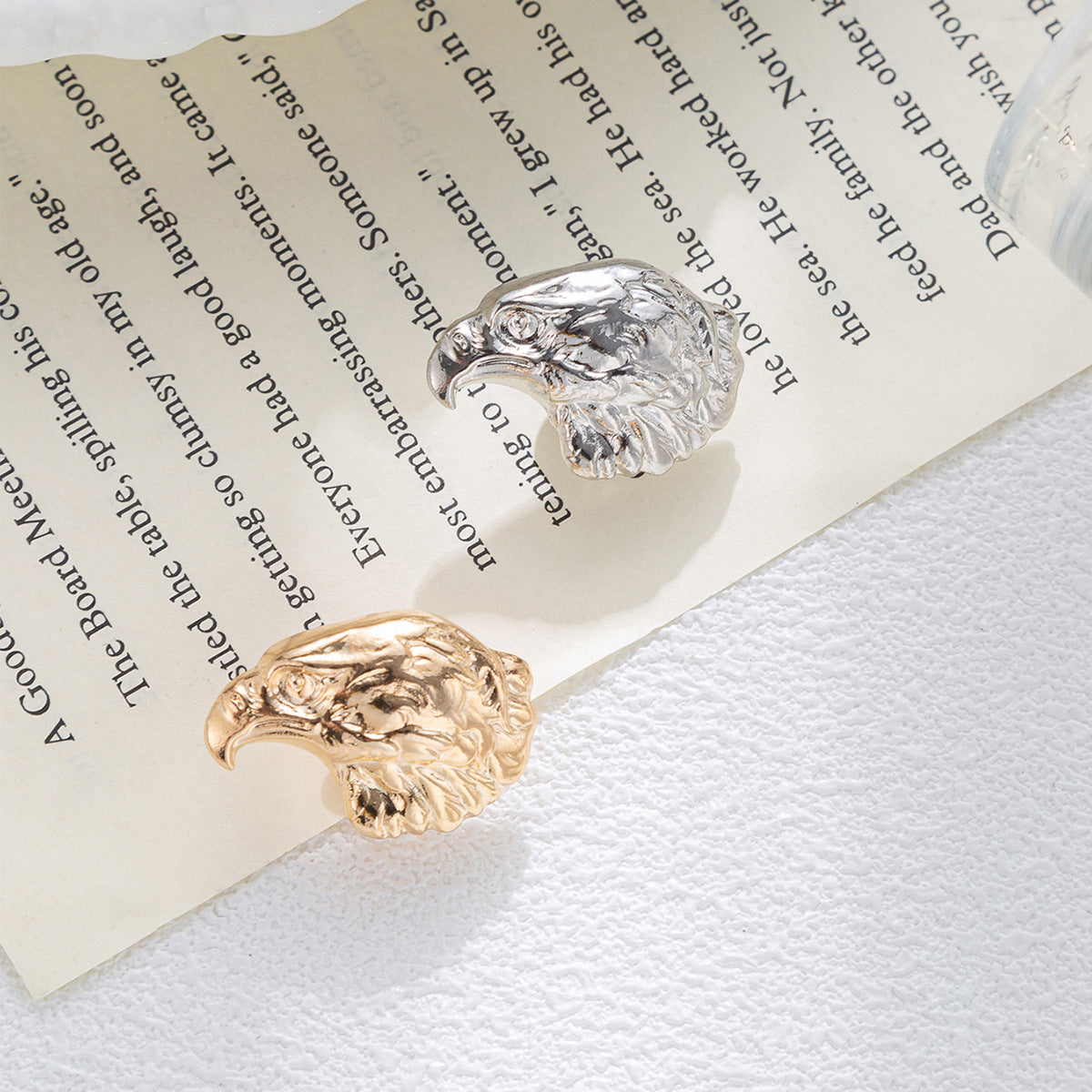 Eagle head tie pins, silver and gold tones, set of two featured eagle head designs