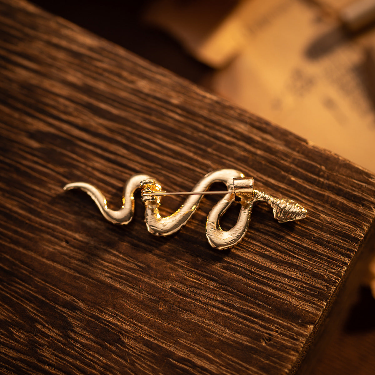 Gold snake brooch pin clasp back with safety pin