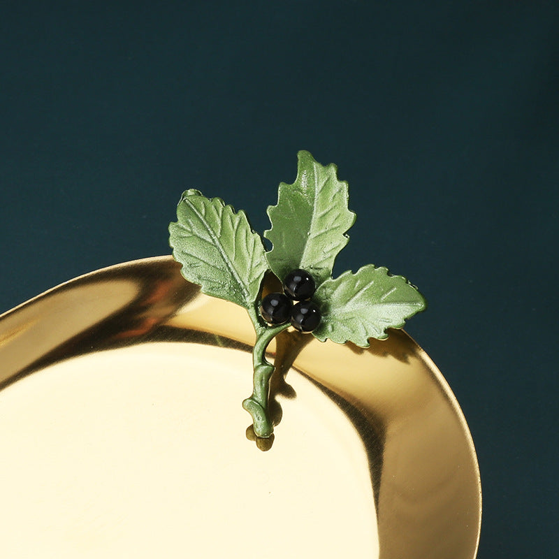 Green 3D leaf brooch pin with four leaves and three black berry accents