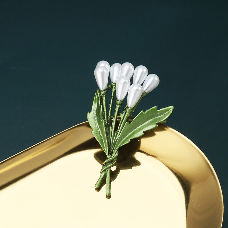 Green 3D leaf brooch pin with multiple white teardrop pearls and fan-shaped leaves