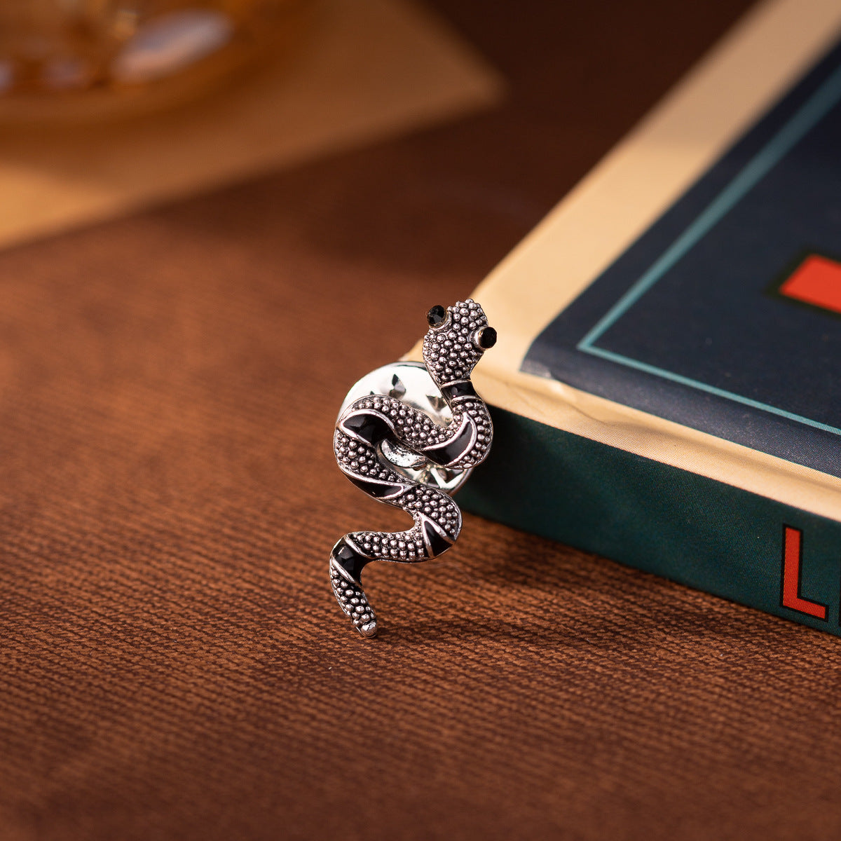 Silver mini snake brooch pin, coiled snake with dark accents