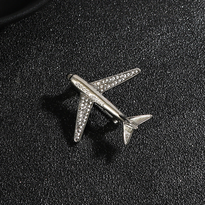 Silver airplane lapel pin brooch with rhinestone trim for men’s suit decoration