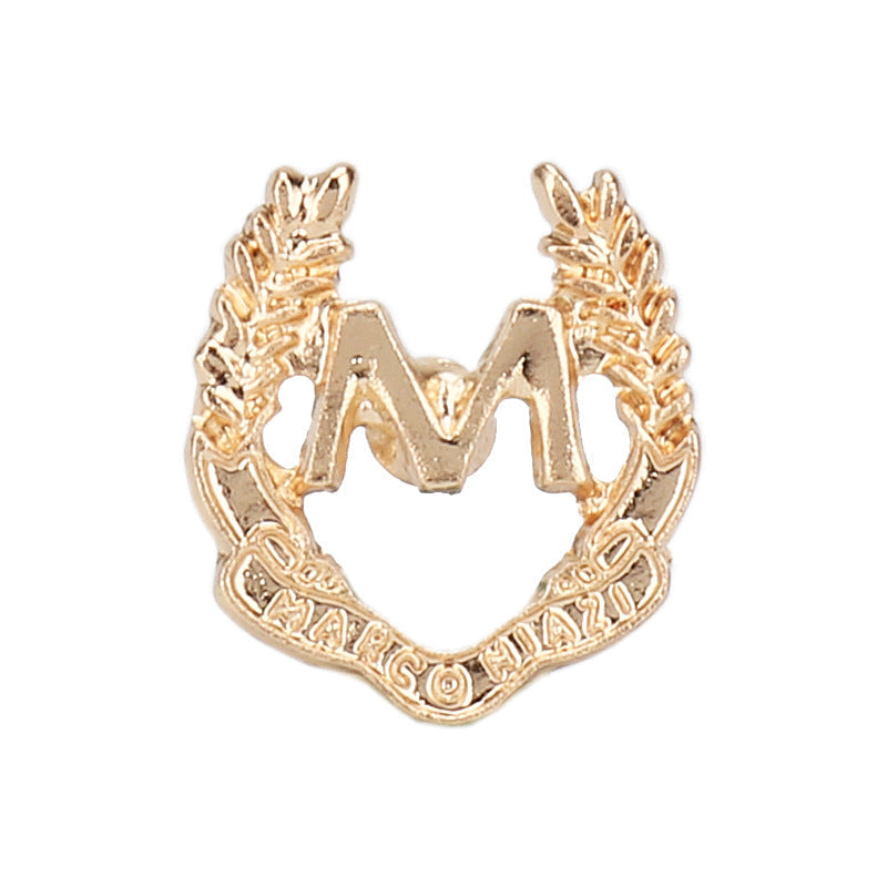 Gold letter M metal brooch with wheat ear wreath, ornate cutout design