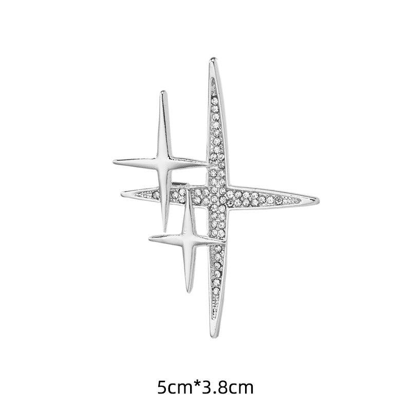 Silver cross-shaped starburst brooch pin, rhinestone inlay, 5cm x 3.8cm