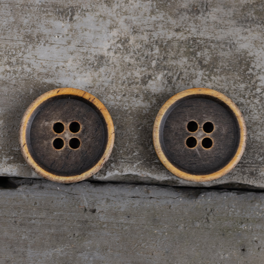 Two 4-hole vintage brown bone buttons with light tan outer rim