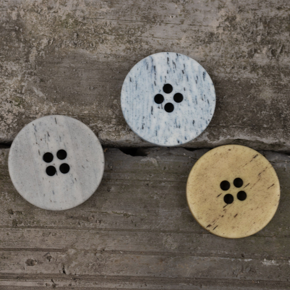 Sky blue round 4-hole vintage cow bone button, 15–25mm, speckled finish