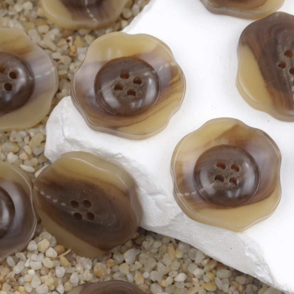 Coffee-brown resin 4-hole buttons with off-white accents, irregular floral style