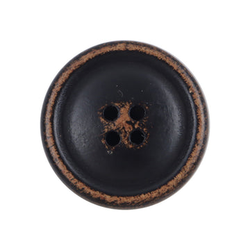 Round black lacquered wood button with four holes, close-up