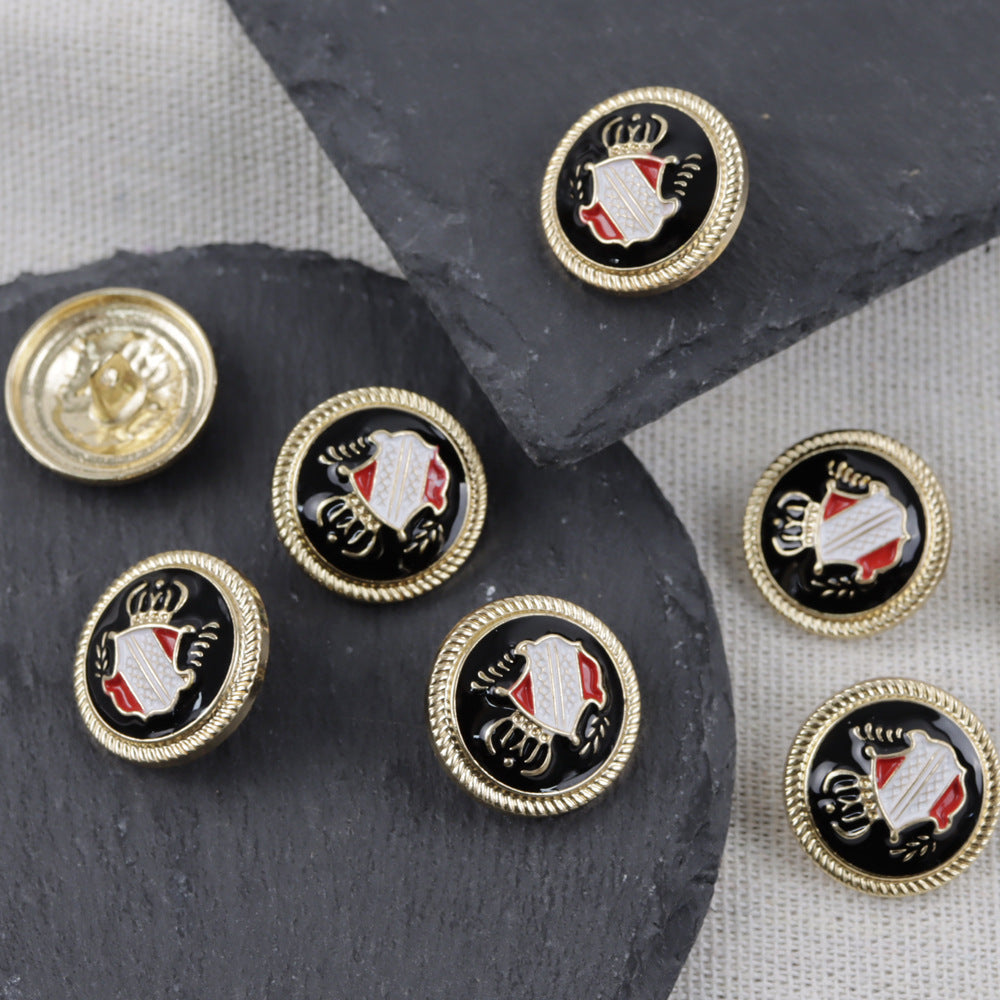 Boutons métal à tige, finition dorée, écusson blanc et rouge sur noir