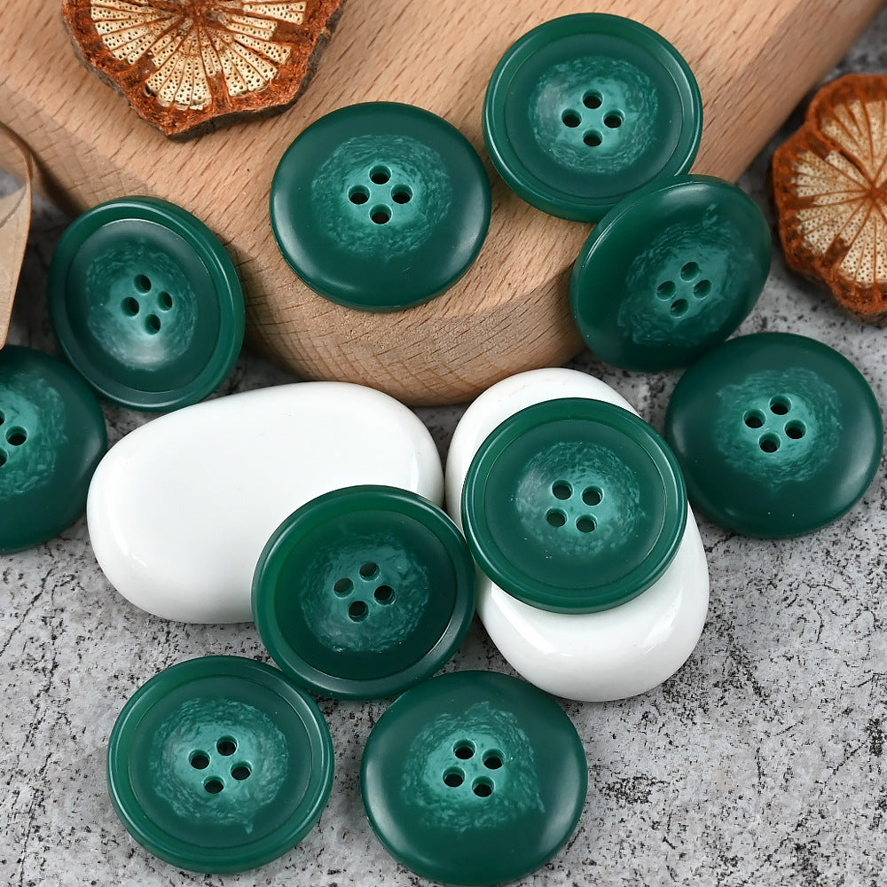 Round 4-hole urea buttons, dark green and white mix, glossy finish